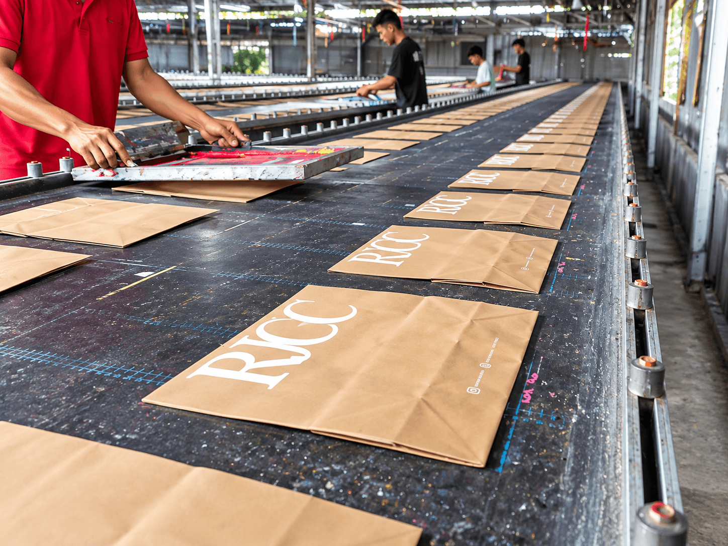 Manual screen printing process on packaging bags